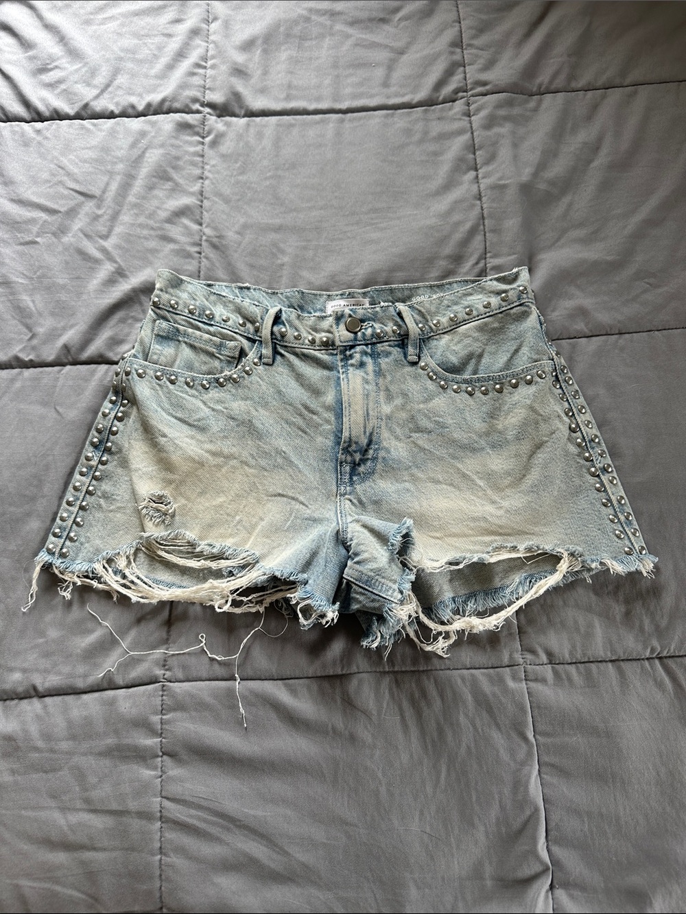 Good American 90s studded denim shorts